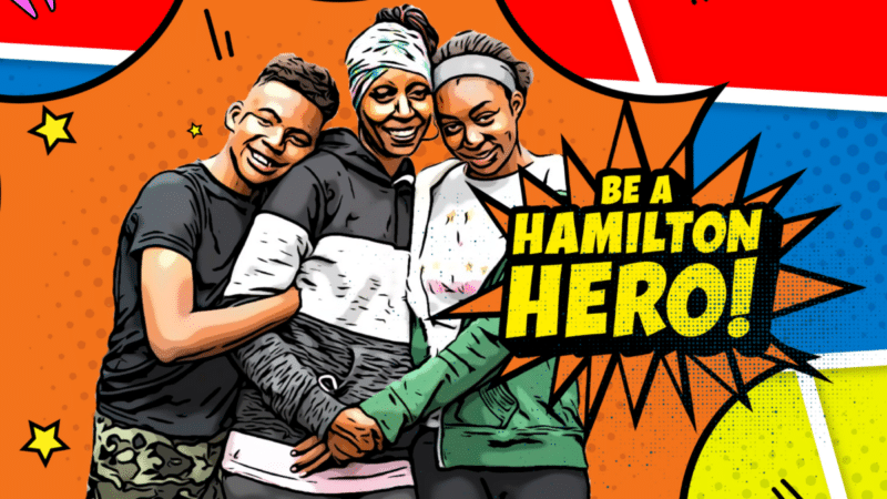 In comic book style an image of a family of three says "BE A HAMILTON HERO"